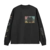 A black long sleeved t shirt featuring the album art for Imagine Dragons album Loom on the left sleeve The shirt is laid flat on a gray surface with a checkered pattern in the background