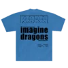 Back of the Imagine Dragons Hollywood Bowl event tee in blue featuring bold black typography with the bands name event date and venue details A word search style text pattern is printed at the top adding a unique design element