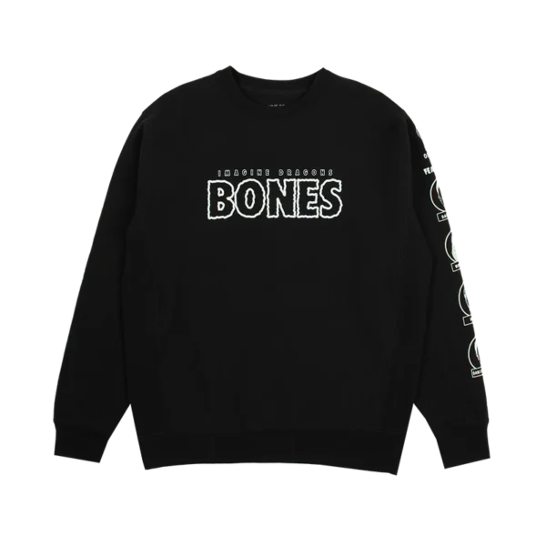 Black Glow in the Dark Bones album merch crewneck sweatshirt featuring a minimalist design The front displays IMAGINE DRAGONS BONES in bold glowing text while the sleeve is decorated with multiple circular logos A sleek and stylish must have for Imagine Dragons fans