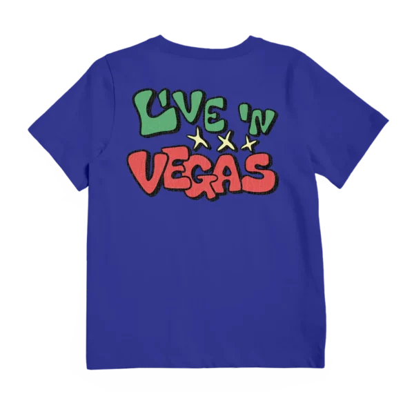 A royal blue Imagine Dragons T shirt featuring a bold graphic on the back with the words Live N Vegas in green and red accompanied by three yellow stars The design has a vibrant playful look making it a standout merch piece for fans