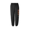 Black ENEMY SWEATPANTS featuring a unique side graphic print with abstract brown and beige elements Comfortable fit with elastic waistband and cuffs