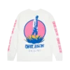 White long sleeve Imagine Dragons Origins tour shirt featuring a stylized graphic of a person standing on a large plant with a pink circular backdrop The bands name Imagine Dragons appears in bold blue text below the design with Origins written underneath in a smaller font The sleeves have repeating pink Imagine Dragons text along their length